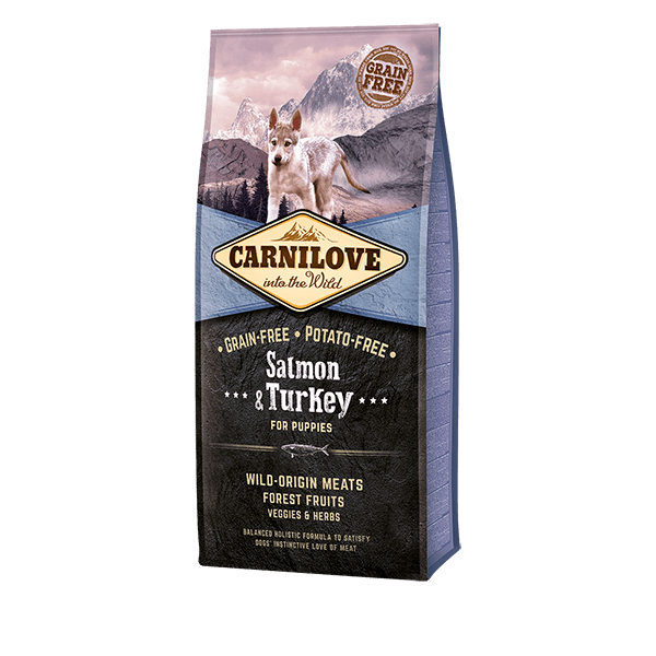 Carnilove puppy food: Salmon & Turkey. Wolf in mountains. 